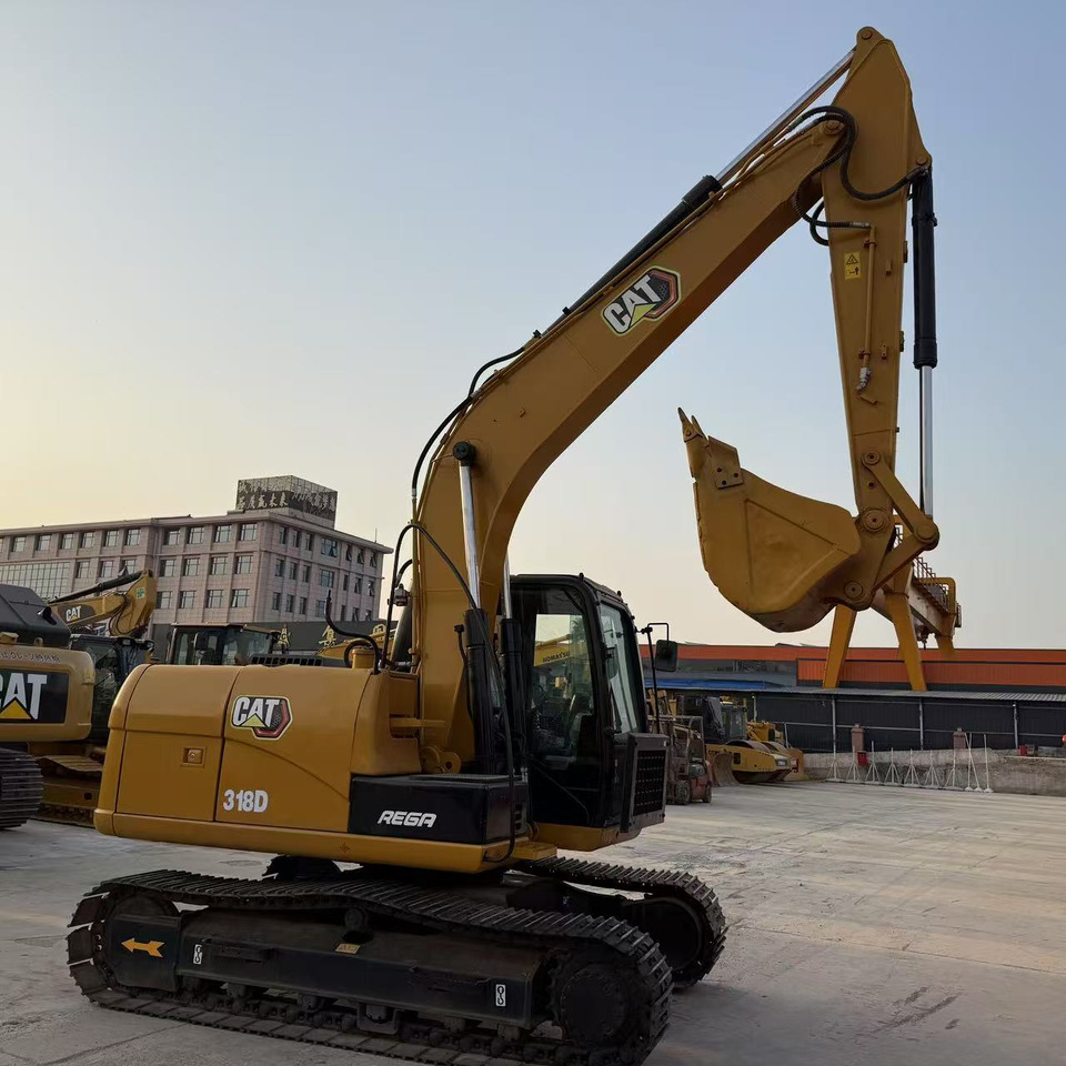 Caterpillar 318D - Ekskavator perayap: gambar 2 Caterpillar 318D - Ekskavator perayap: gambar 2