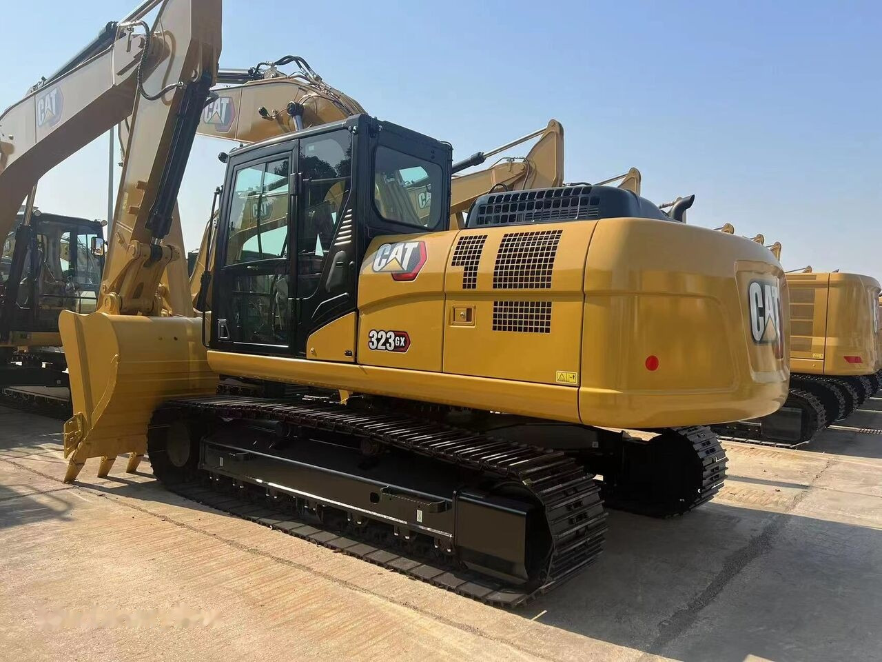 Caterpillar 323GX - Ekskavator perayap: gambar 1 Caterpillar 323GX - Ekskavator perayap: gambar 1
