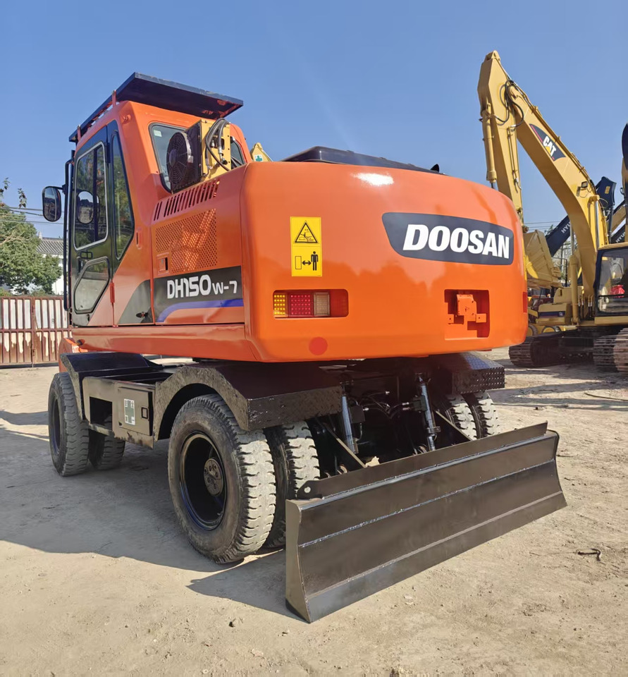 Doosan DH150W - Ekskavator roda: gambar 5 Doosan DH150W - Ekskavator roda: gambar 5