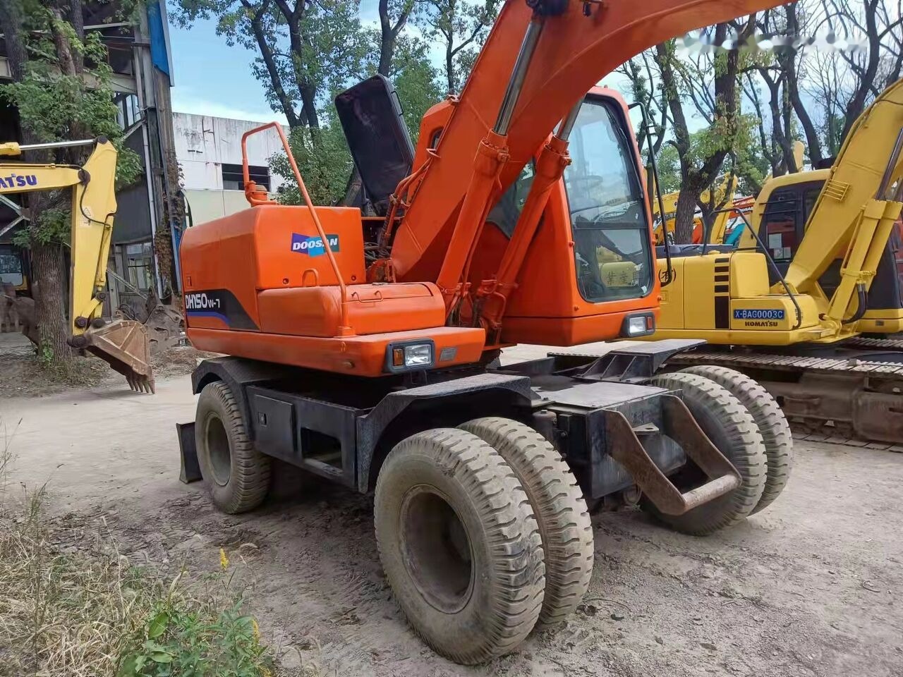 Doosan DH150W - Ekskavator roda: gambar 1 Doosan DH150W - Ekskavator roda: gambar 1