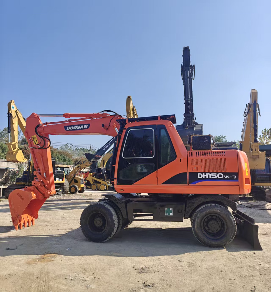 Doosan DH150W - Ekskavator roda: gambar 2 Doosan DH150W - Ekskavator roda: gambar 2