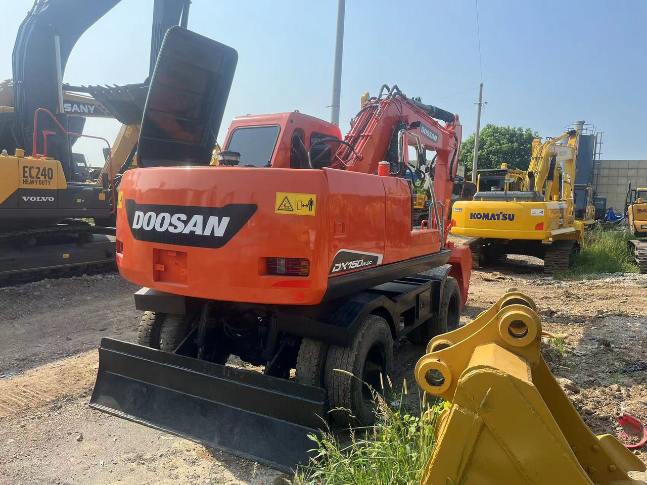 Doosan DX150W-9C - Ekskavator roda: gambar 2 Doosan DX150W-9C - Ekskavator roda: gambar 2