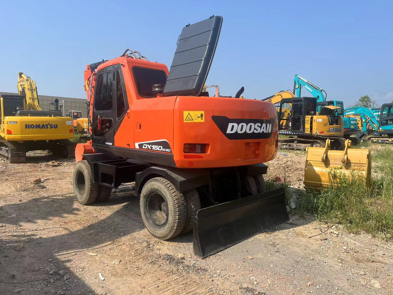 Doosan DX150W-9C - Ekskavator roda: gambar 4 Doosan DX150W-9C - Ekskavator roda: gambar 4