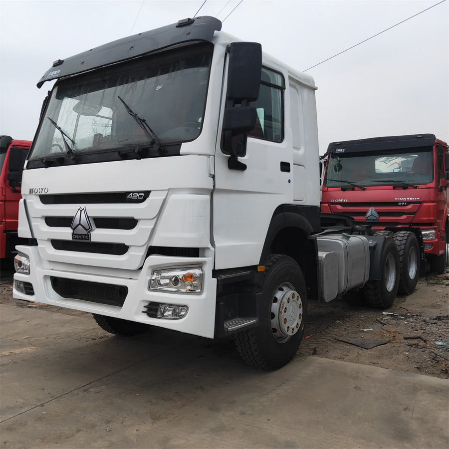Sinotruk HOWO 420 tractor - Tempat sampah mini: gambar 1 Sinotruk HOWO 420 tractor - Tempat sampah mini: gambar 1