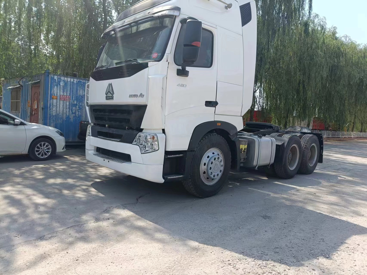 Sinotruk HOWO A7 tractor - Tempat sampah mini: gambar 2 Sinotruk HOWO A7 tractor - Tempat sampah mini: gambar 2