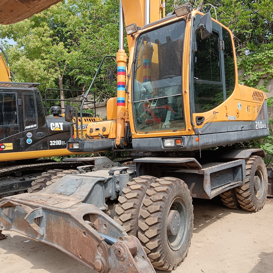 HYUNDAI R210W-9 R 210 W - 9 - Ekskavator roda: gambar 1 HYUNDAI R210W-9 R 210 W - 9 - Ekskavator roda: gambar 1