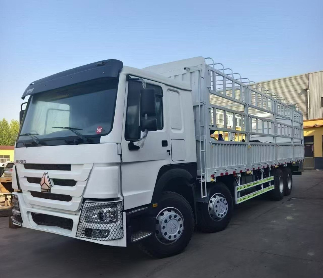 SINOTRUK HOWO 8*4 WITH FENCE - Truk pengangkut hewan: gambar 1 SINOTRUK HOWO 8*4 WITH FENCE - Truk pengangkut hewan: gambar 1
