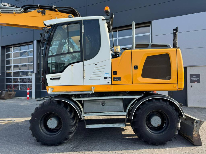 Liebherr A 914 Litronic - Ekskavator roda: gambar 3 Liebherr A 914 Litronic - Ekskavator roda: gambar 3