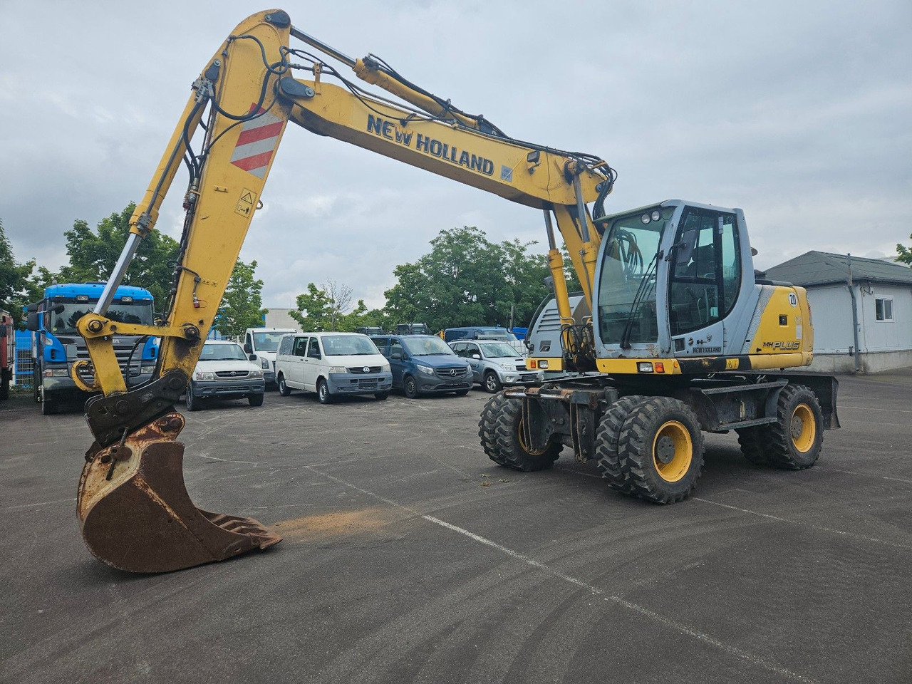 New Holland MH Plus 18t Mobilbagger - Ekskavator roda: gambar 1 New Holland MH Plus 18t Mobilbagger - Ekskavator roda: gambar 1