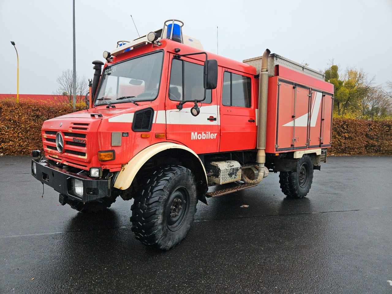 Unimog U4000 4x4 DOKA Tanklöschfahrzeug Feuerwehr - Truk tangki: gambar 1 Unimog U4000 4x4 DOKA Tanklöschfahrzeug Feuerwehr - Truk tangki: gambar 1