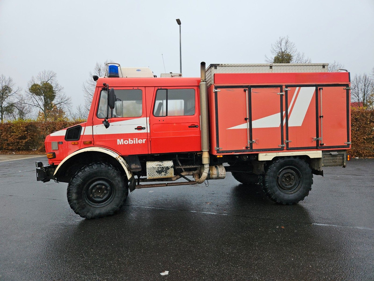 Unimog U4000 4x4 DOKA Tanklöschfahrzeug Feuerwehr - Truk tangki: gambar 2 Unimog U4000 4x4 DOKA Tanklöschfahrzeug Feuerwehr - Truk tangki: gambar 2
