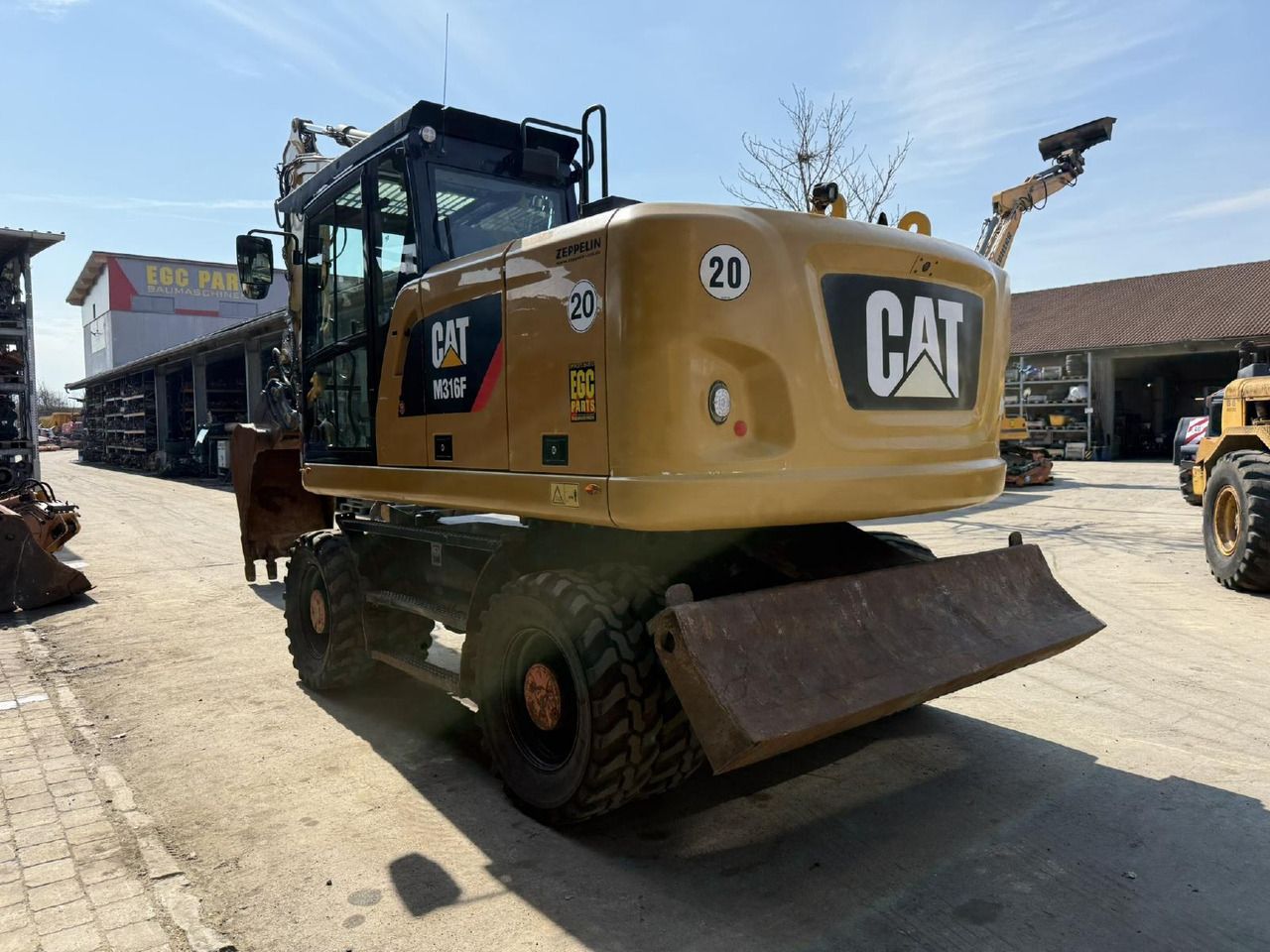 Caterpillar M 316F - Ekskavator roda: gambar 5 Caterpillar M 316F - Ekskavator roda: gambar 5