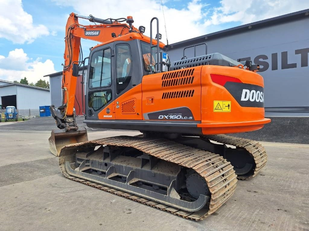 Doosan DX160LCH-5 METSÄMALLI KALLISTAJALLA  - Ekskavator perayap: gambar 2 Doosan DX160LCH-5 METSÄMALLI KALLISTAJALLA  - Ekskavator perayap: gambar 2