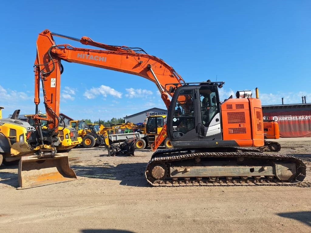 Hitachi ZX225USLC-5 - Ekskavator perayap: gambar 1 Hitachi ZX225USLC-5 - Ekskavator perayap: gambar 1