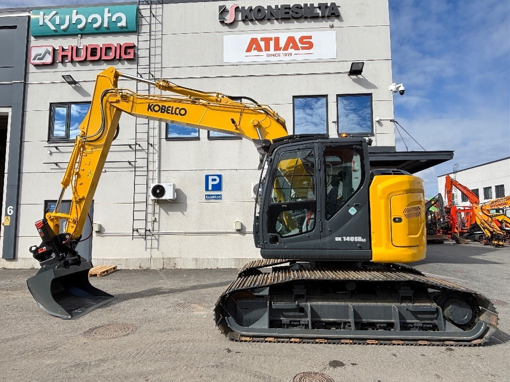 Kobelco SK140SRLC-7 KOROTETTU SUOALUSTA 900MM - Ekskavator perayap: gambar 1 Kobelco SK140SRLC-7 KOROTETTU SUOALUSTA 900MM - Ekskavator perayap: gambar 1