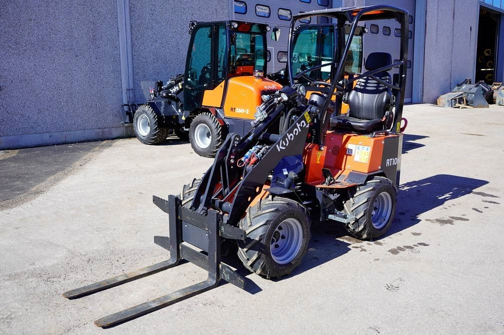 Kubota RT100-2 - Pemuat ringkas: gambar 2 Kubota RT100-2 - Pemuat ringkas: gambar 2