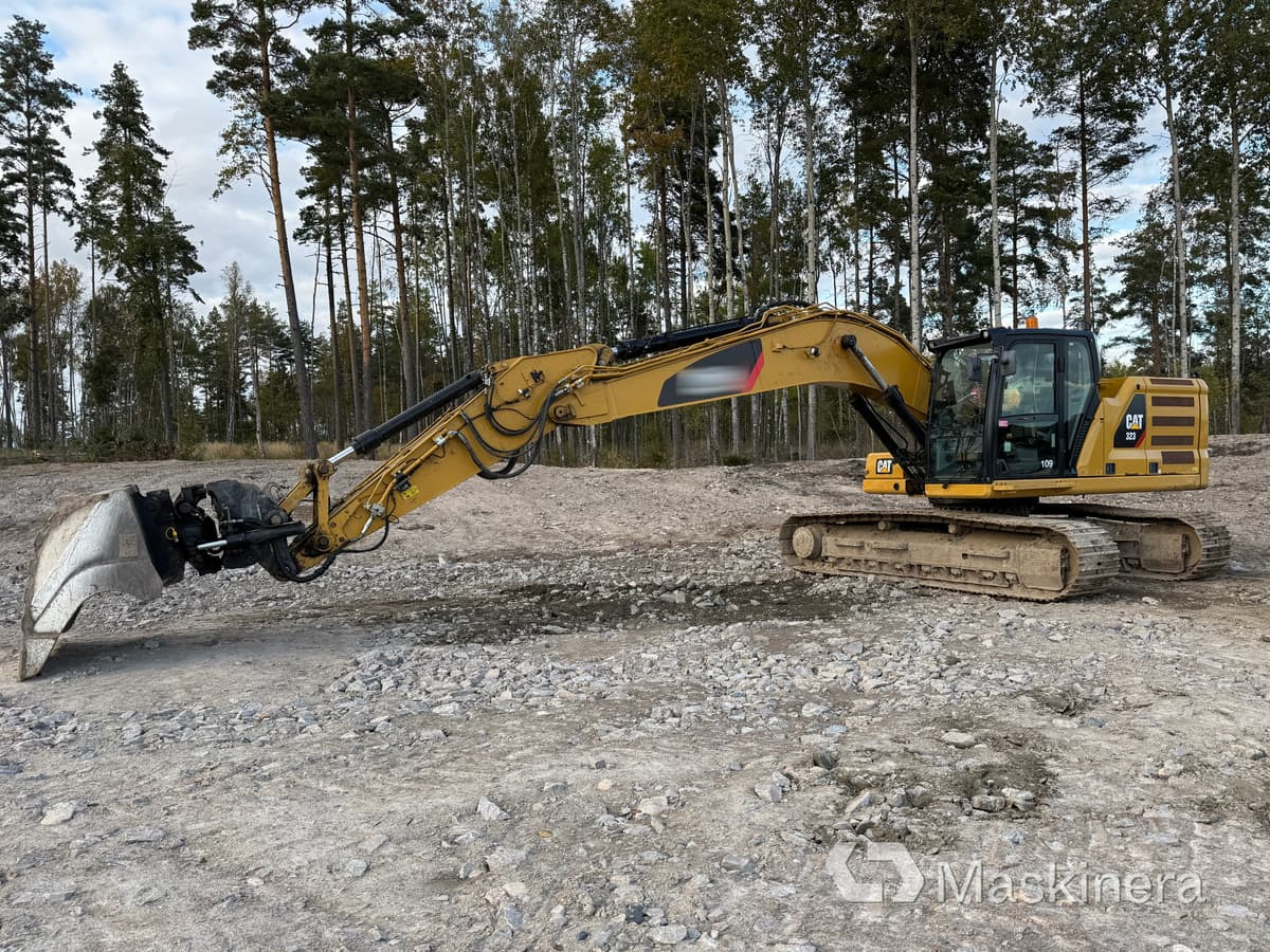 Grävmaskin CAT 323 Next Generation - Ekskavator perayap: gambar 1 Grävmaskin CAT 323 Next Generation - Ekskavator perayap: gambar 1