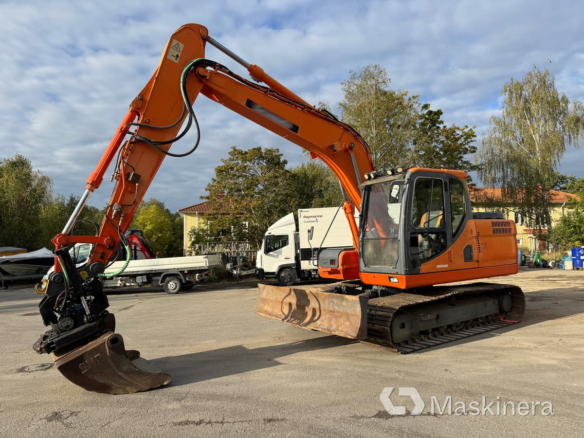 Grävmaskin Doosan DX140LC - Ekskavator perayap: gambar 1 Grävmaskin Doosan DX140LC - Ekskavator perayap: gambar 1