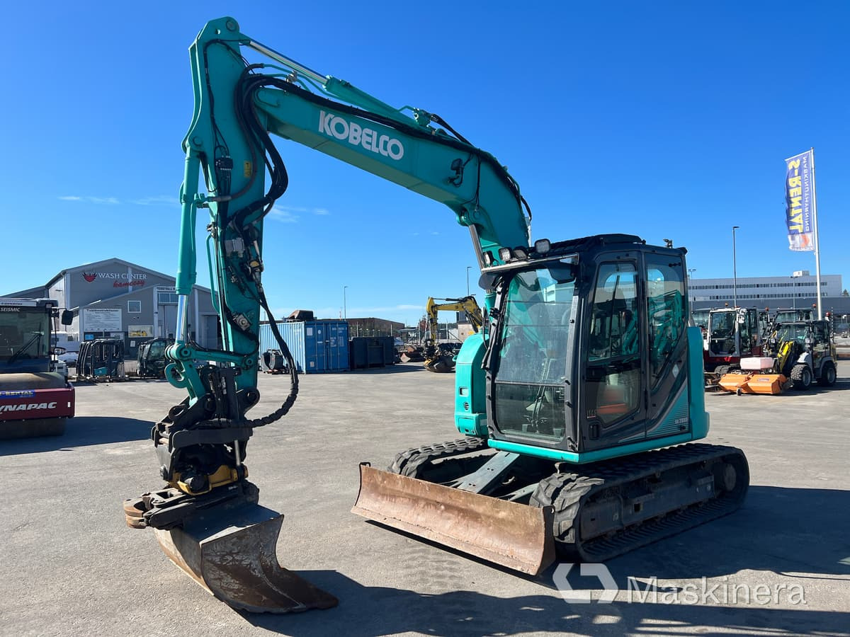 Grävmaskin Kobelco SK75SR-3E - Ekskavator perayap: gambar 1 Grävmaskin Kobelco SK75SR-3E - Ekskavator perayap: gambar 1
