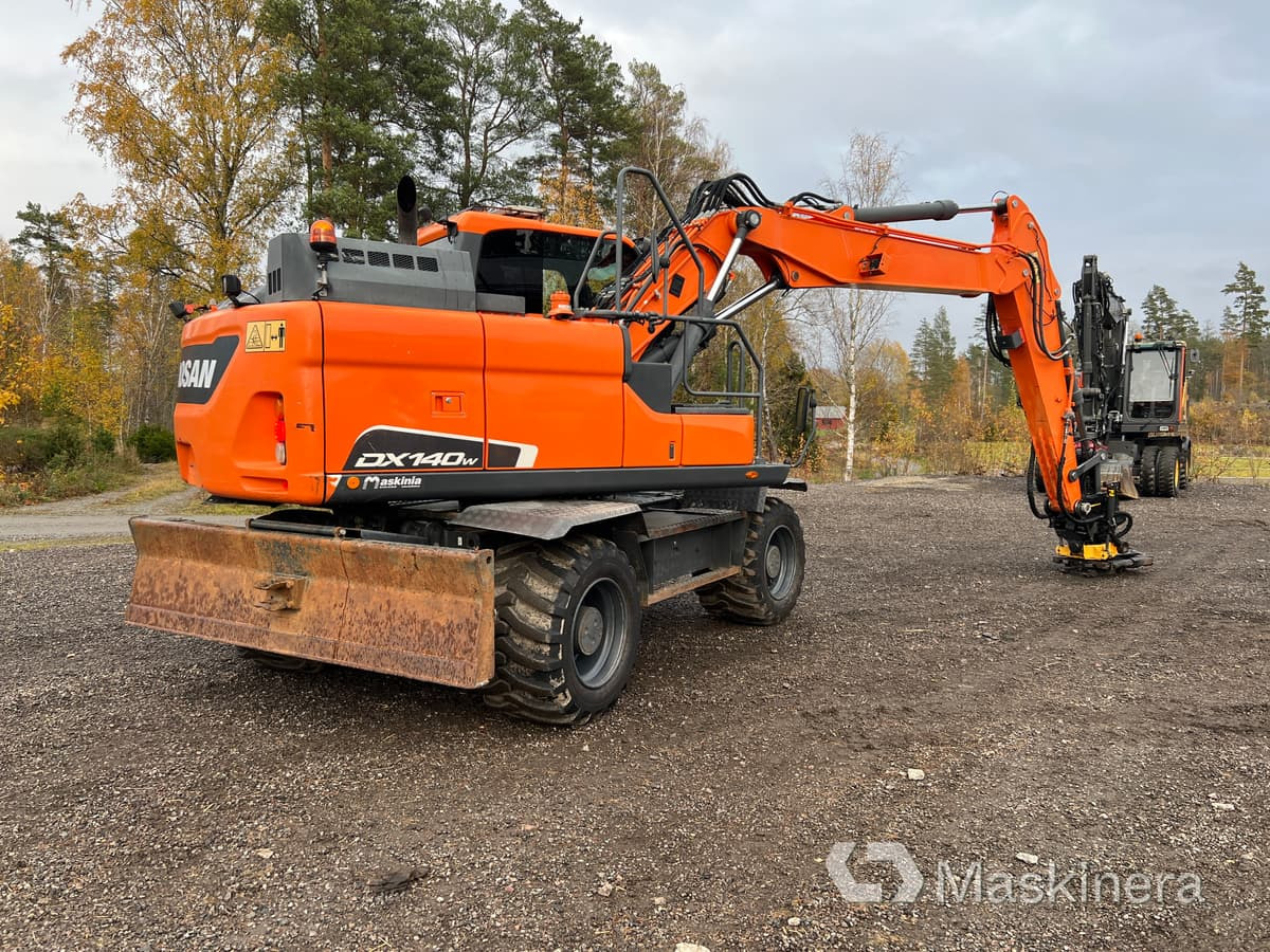 Hjulgrävare Doosan DX140-5 - Ekskavator perayap: gambar 5 Hjulgrävare Doosan DX140-5 - Ekskavator perayap: gambar 5