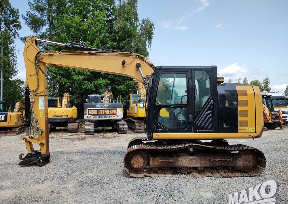 Caterpillar 312 E - Ekskavator perayap: gambar 1 Caterpillar 312 E - Ekskavator perayap: gambar 1