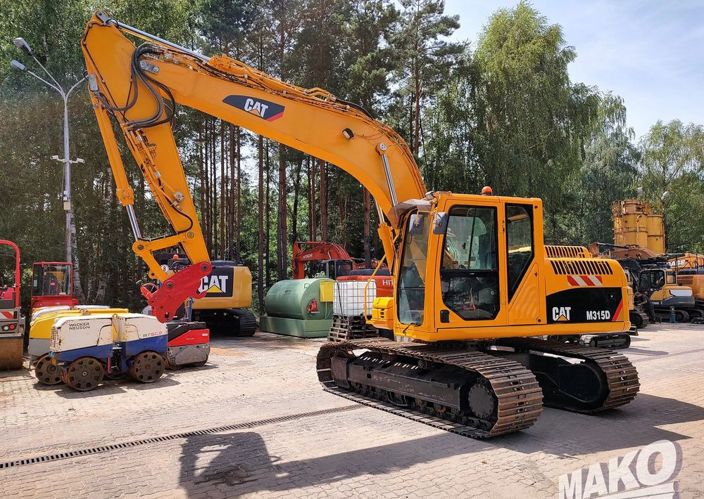 Caterpillar 315D - Ekskavator perayap: gambar 1 Caterpillar 315D - Ekskavator perayap: gambar 1