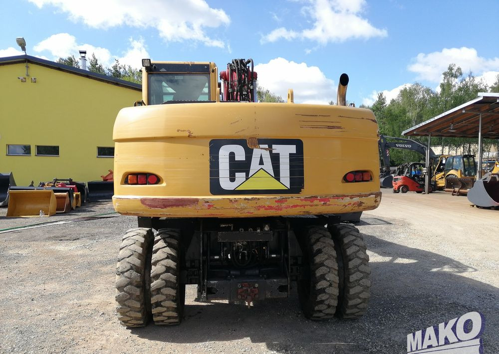 Caterpillar M315 C - Ekskavator roda: gambar 4 Caterpillar M315 C - Ekskavator roda: gambar 4