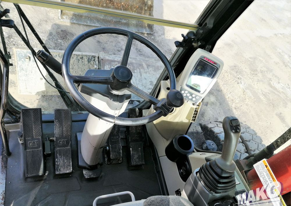 Ekskavator roda Caterpillar M315 C: gambar 10