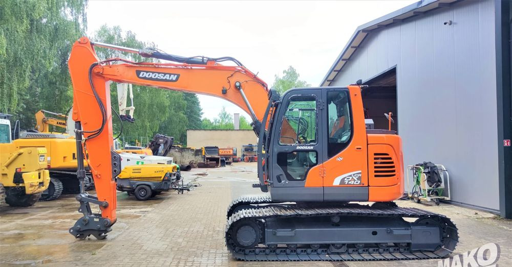 Doosan DX140LCR-5 - Ekskavator perayap: gambar 1 Doosan DX140LCR-5 - Ekskavator perayap: gambar 1