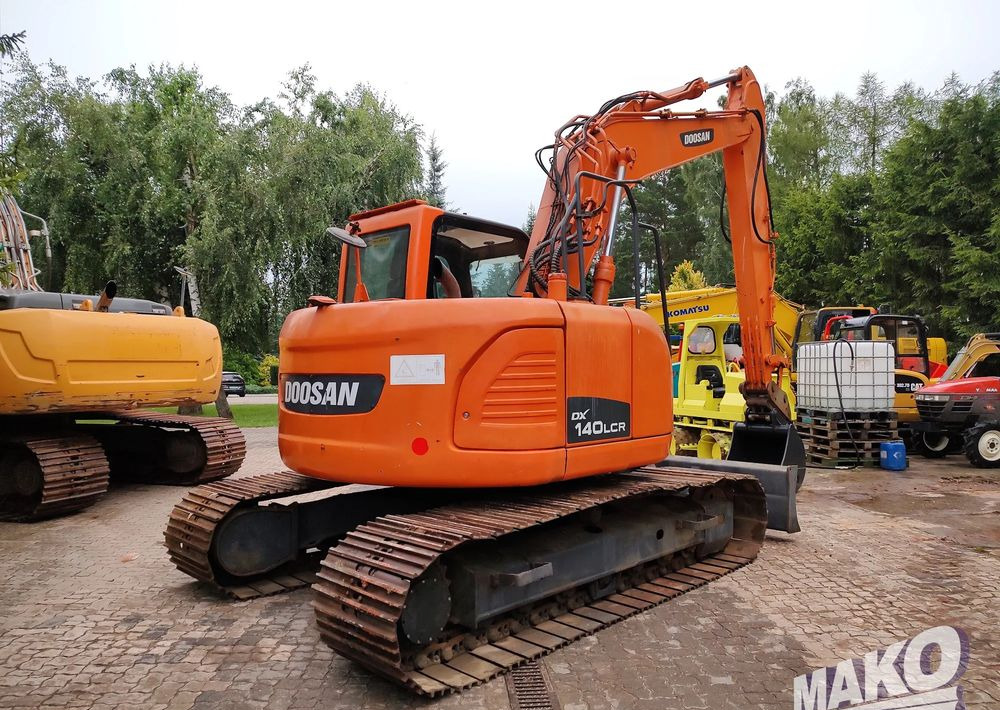 Doosan DX140LCR - Ekskavator perayap: gambar 4 Doosan DX140LCR - Ekskavator perayap: gambar 4