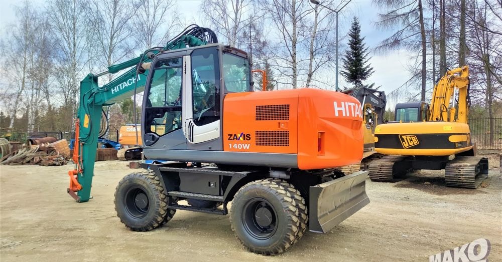 Hitachi ZX140W-3 - Ekskavator roda: gambar 2 Hitachi ZX140W-3 - Ekskavator roda: gambar 2
