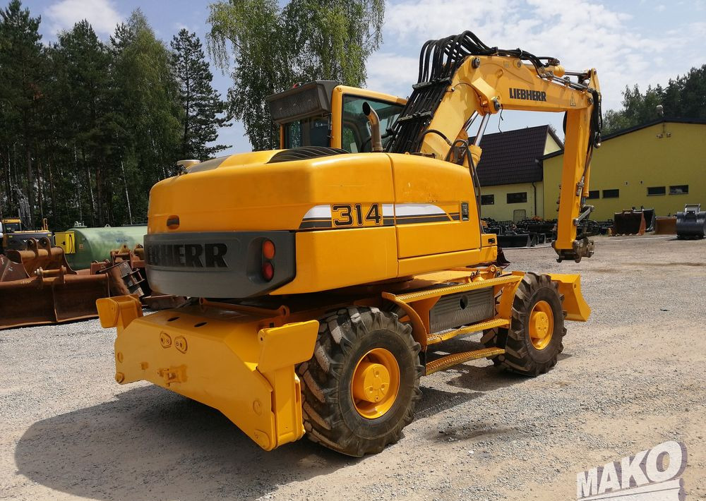 Liebherr A 314 Litronic - Ekskavator roda: gambar 5 Liebherr A 314 Litronic - Ekskavator roda: gambar 5