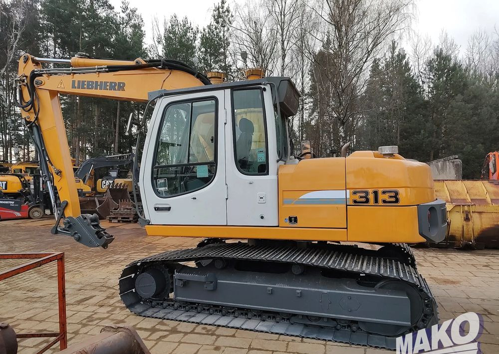 Liebherr R 313 Litronic - Ekskavator perayap: gambar 1 Liebherr R 313 Litronic - Ekskavator perayap: gambar 1