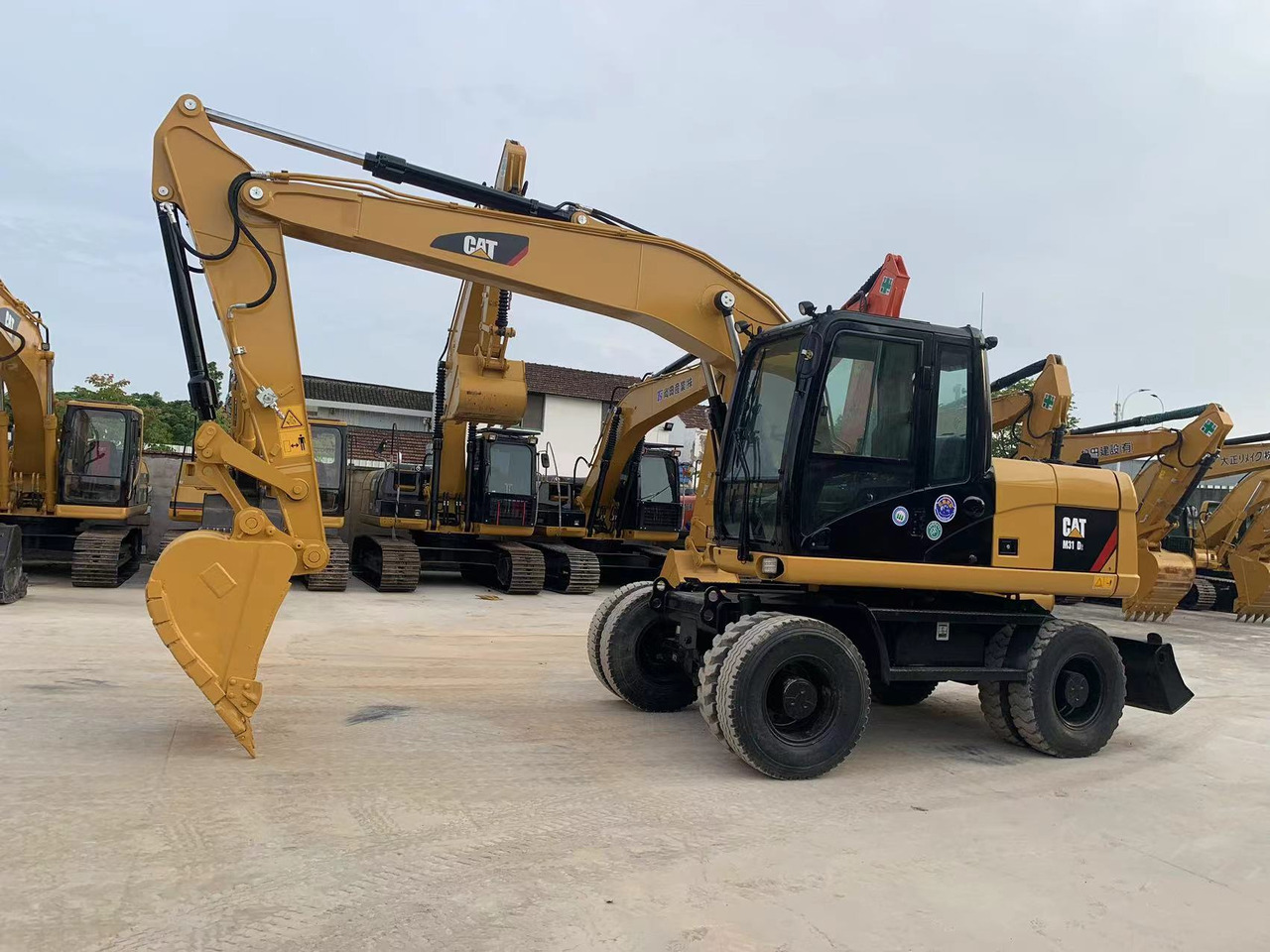 Caterpillar M315D Wheel Excavator Moving by Tires - Ekskavator roda: gambar 2 Caterpillar M315D Wheel Excavator Moving by Tires - Ekskavator roda: gambar 2