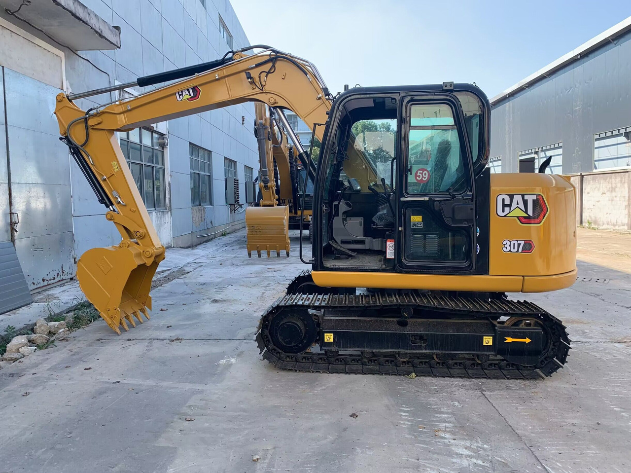 Caterpillar Small Digger CAT 307E2, 306E2 - Ekskavator perayap: gambar 1 Caterpillar Small Digger CAT 307E2, 306E2 - Ekskavator perayap: gambar 1