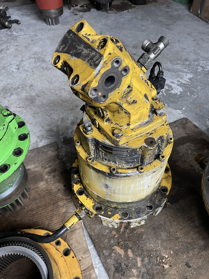 NEW HOLLAND Mh plus - Motor ayun untuk Ekskavator: gambar 1 NEW HOLLAND Mh plus - Motor ayun untuk Ekskavator: gambar 1