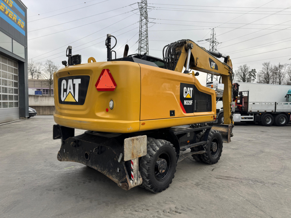 CATERPILLAR M320F Oilquick - Ekskavator roda: gambar 4 CATERPILLAR M320F Oilquick - Ekskavator roda: gambar 4