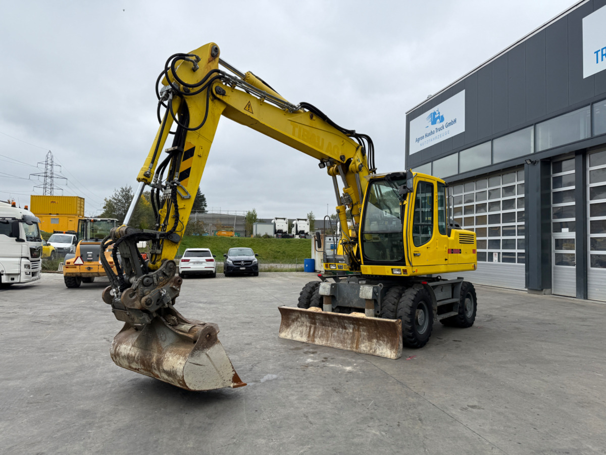 LIEBHERR 900 C 3xBuckets - Ekskavator roda: gambar 1 LIEBHERR 900 C 3xBuckets - Ekskavator roda: gambar 1