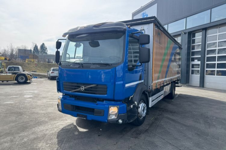 Volvo FLL-290 - Truk dengan terpal samping: gambar 1 Volvo FLL-290 - Truk dengan terpal samping: gambar 1