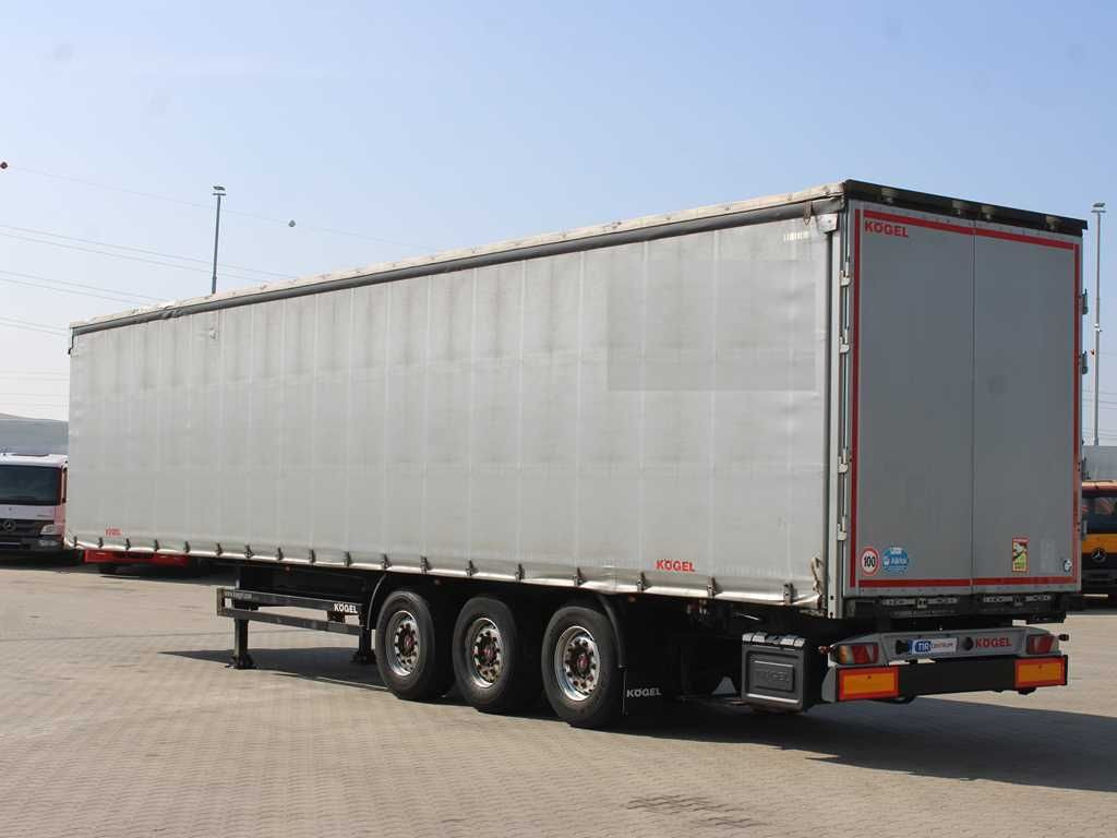 Kögel SN 24, LIFTING AXLE, SAF, MULDA, MULTILOCK - Semi-trailer dengan terpal samping: gambar 4 Kögel SN 24, LIFTING AXLE, SAF, MULDA, MULTILOCK - Semi-trailer dengan terpal samping: gambar 4
