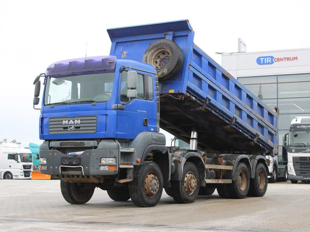 MAN TGA 41.480, 8X6, THREE-SIDED, EURO 3, RETARDER - Truk jungkit: gambar 1 MAN TGA 41.480, 8X6, THREE-SIDED, EURO 3, RETARDER - Truk jungkit: gambar 1
