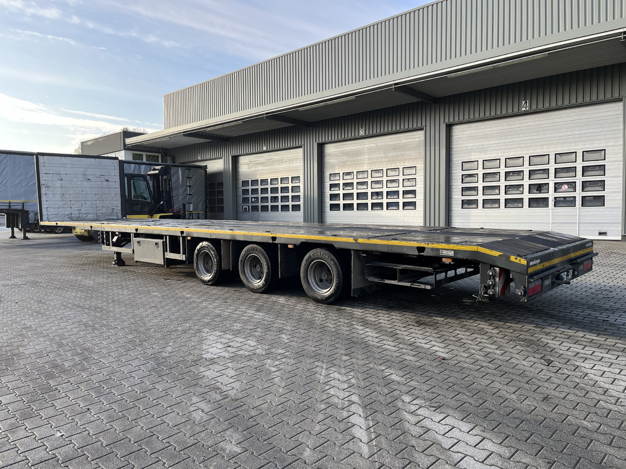 Meusburger 3-Achs-Mega-Tele-Plateau nachlaufgelenkt - Semi-trailer flatbed: gambar 1 Meusburger 3-Achs-Mega-Tele-Plateau nachlaufgelenkt - Semi-trailer flatbed: gambar 1