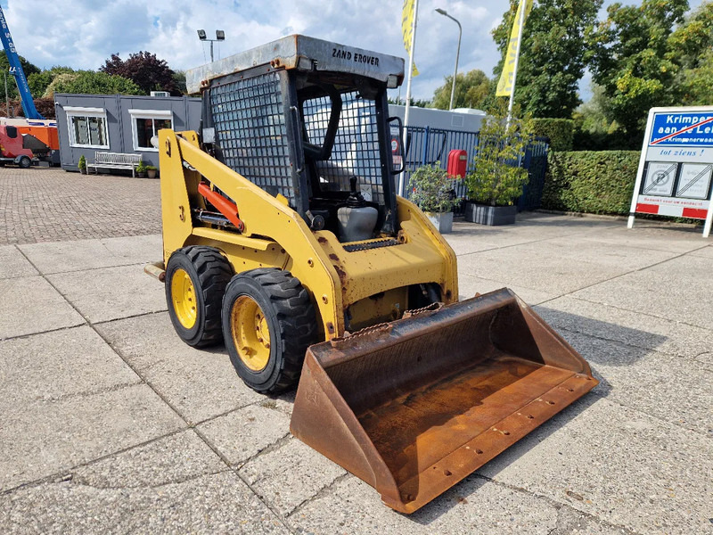 Caterpillar 216B3 schranklader met 1191 uur - Skid steer: gambar 2 Caterpillar 216B3 schranklader met 1191 uur - Skid steer: gambar 2
