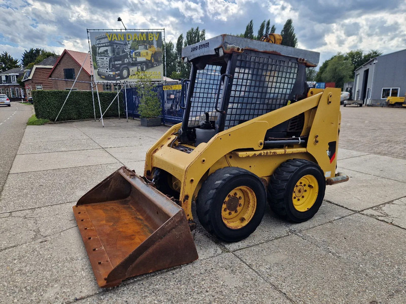 Caterpillar 216B3 schranklader met 1191 uur - Skid steer: gambar 1 Caterpillar 216B3 schranklader met 1191 uur - Skid steer: gambar 1