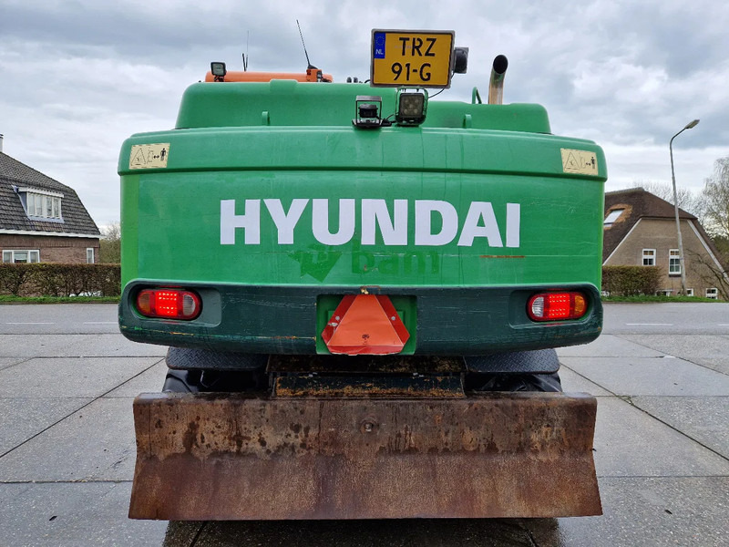 Hyundai Robex 160W-9A met 6-cilinder Cummins motor - Ekskavator roda: gambar 3 Hyundai Robex 160W-9A met 6-cilinder Cummins motor - Ekskavator roda: gambar 3