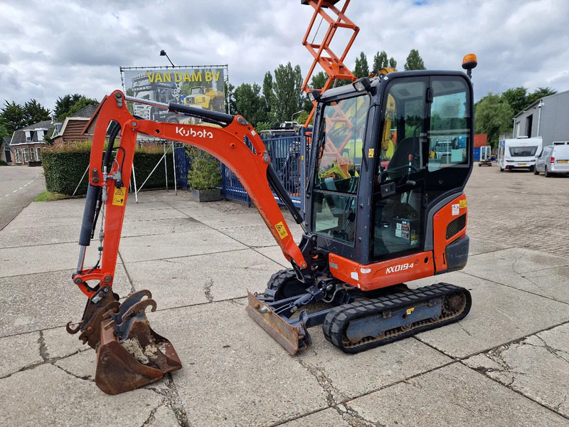 Kubota KX019-4 CW05 met 2 bakken - Ekskavator mini: gambar 1 Kubota KX019-4 CW05 met 2 bakken - Ekskavator mini: gambar 1