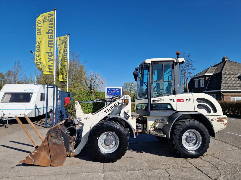Terex TL80 palletvorken en 4in1-bak - Wheel loader: gambar 1 Terex TL80 palletvorken en 4in1-bak - Wheel loader: gambar 1