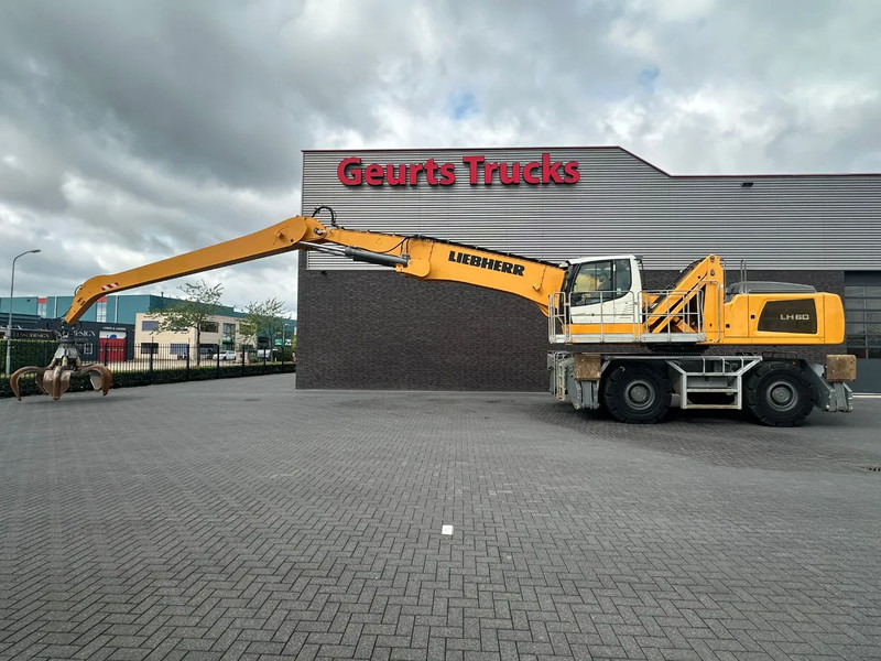 Mesin pengisi Liebherr LH 60 M LITRONIC INDUSTRY MATERIAL HANDLER/ UMSCHLAGBAGGER/ OVERSLAGKRAAN: gambar 12 Mesin pengisi Liebherr LH 60 M LITRONIC INDUSTRY MATERIAL HANDLER/ UMSCHLAGBAGGER/ OVERSLAGKRAAN: gambar 12