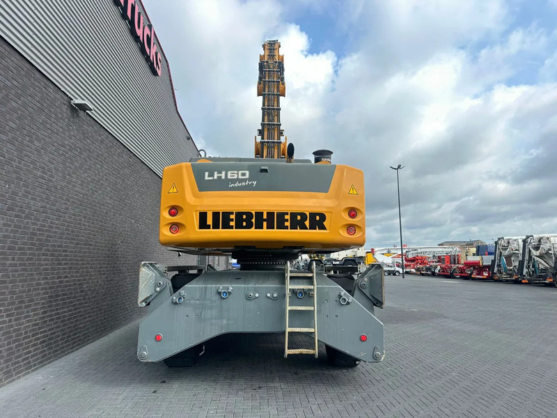 Mesin pengisi Liebherr LH 60 M LITRONIC INDUSTRY MATERIAL HANDLER/ UMSCHLAGBAGGER/ OVERSLAGKRAAN: gambar 13 Mesin pengisi Liebherr LH 60 M LITRONIC INDUSTRY MATERIAL HANDLER/ UMSCHLAGBAGGER/ OVERSLAGKRAAN: gambar 13