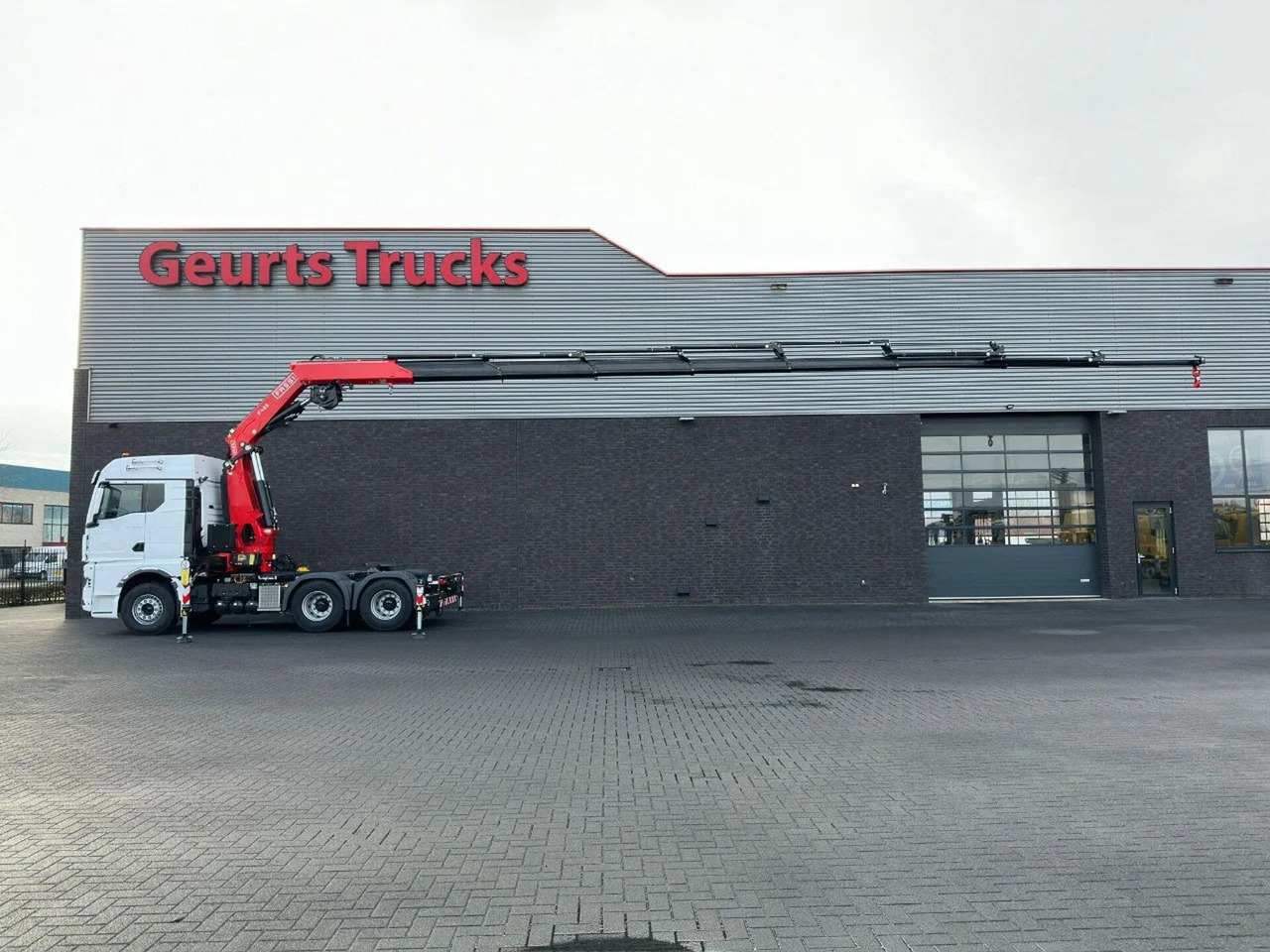 MAN TGX 33.520 6X4 TREKKER-BAKWAGEN COMBI + FASSI F4 - Truk derek: gambar 1 MAN TGX 33.520 6X4 TREKKER-BAKWAGEN COMBI + FASSI F4 - Truk derek: gambar 1